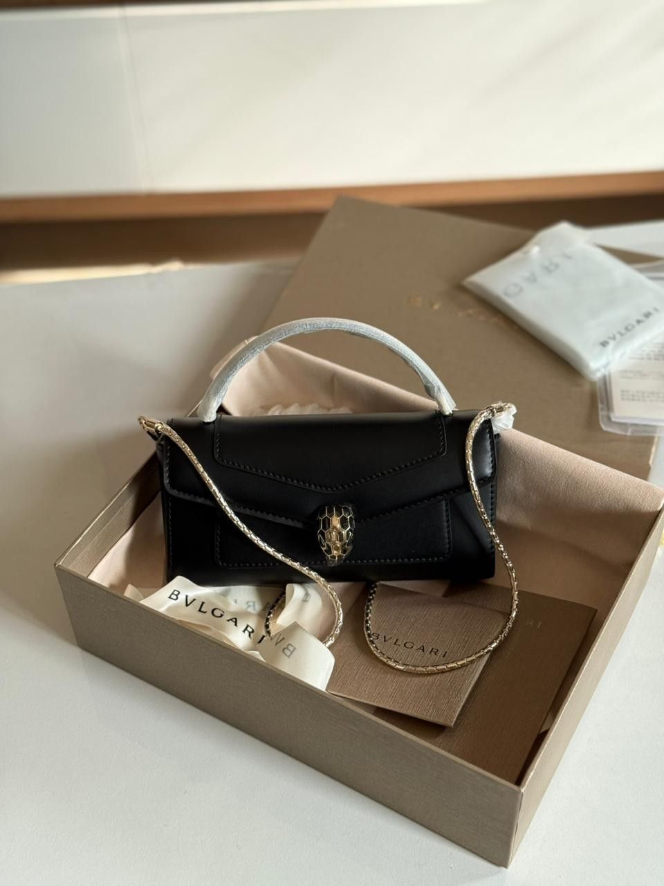 BvlgariBlackCalfleatherSerpentiForeverPhonecase Bvlgari Black Calf leather Serpenti Forever Phone Case