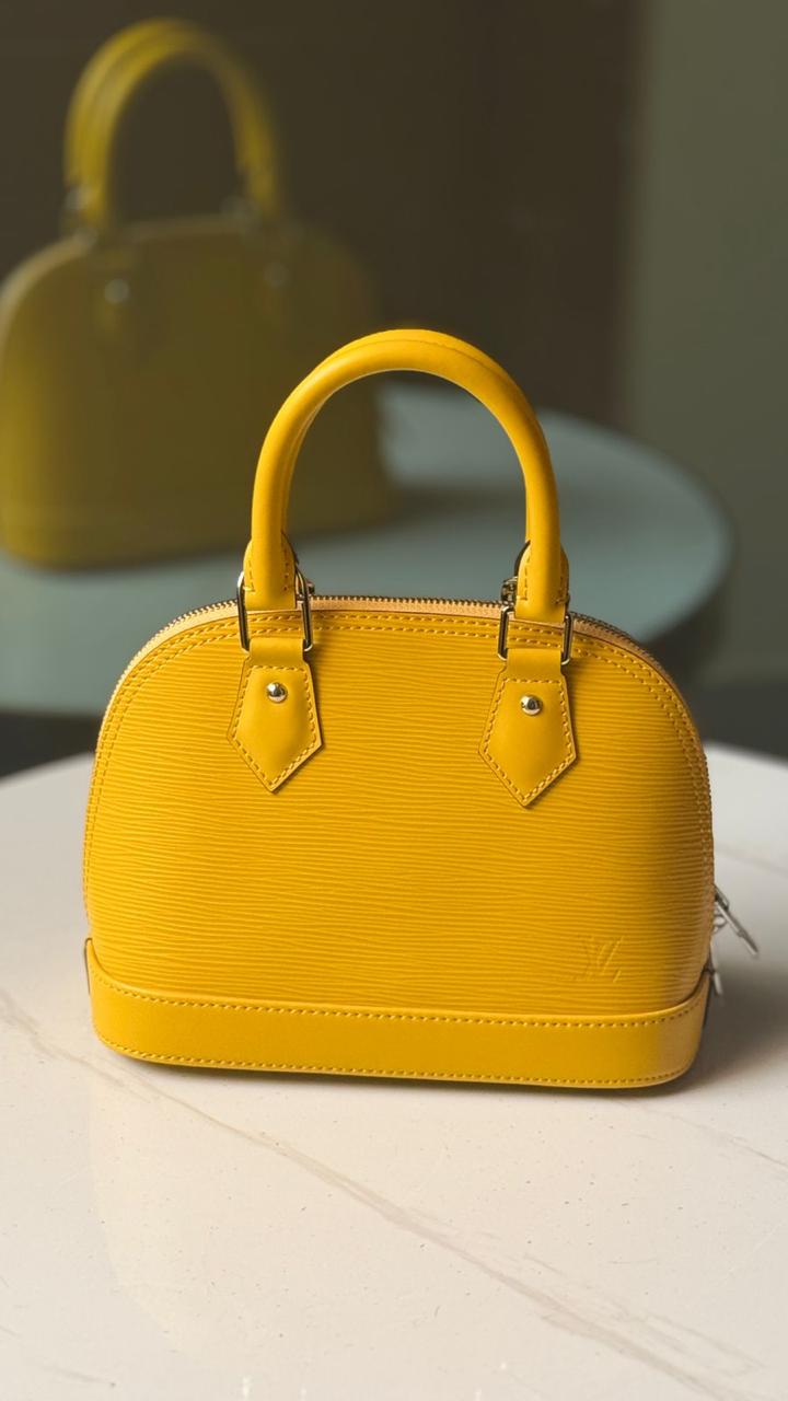 Louis Vuitton Alma BB Bright Yellow Epi Leather Handbag Louis Vuitton Alma BB Bright Yellow Epi Leather Handbag - Image 1
