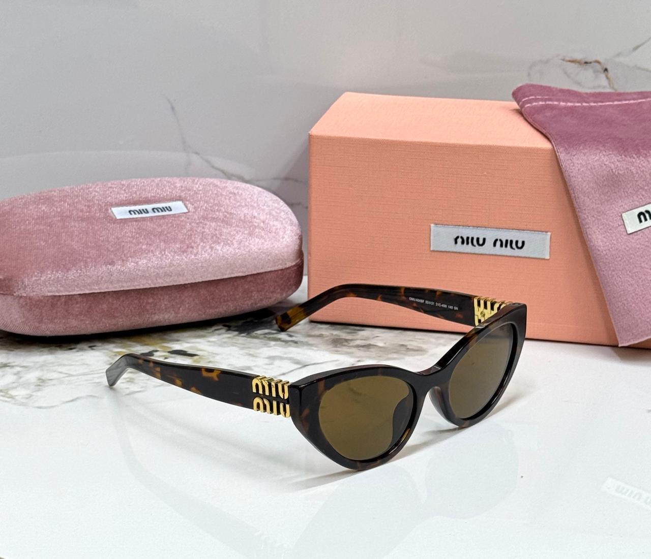 WhatsApp Image 2026-04-20 at 2.01.57 PM (1) MIU MIU Cat-Eye Acetate Sunglasses - Image 1