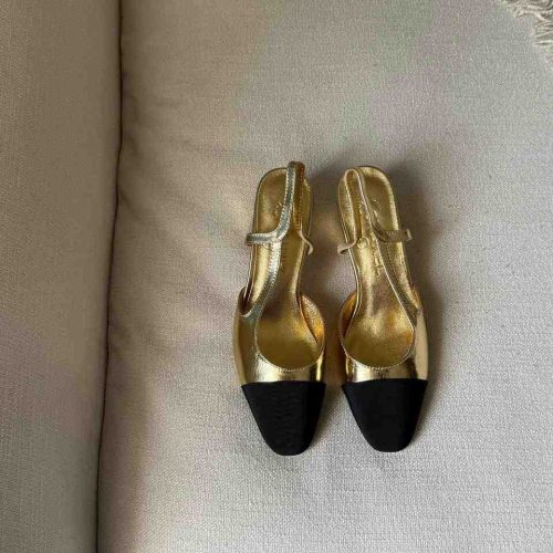 Chanel Gold And Black Laminated Lambskin Leather CC Slingback Pumps