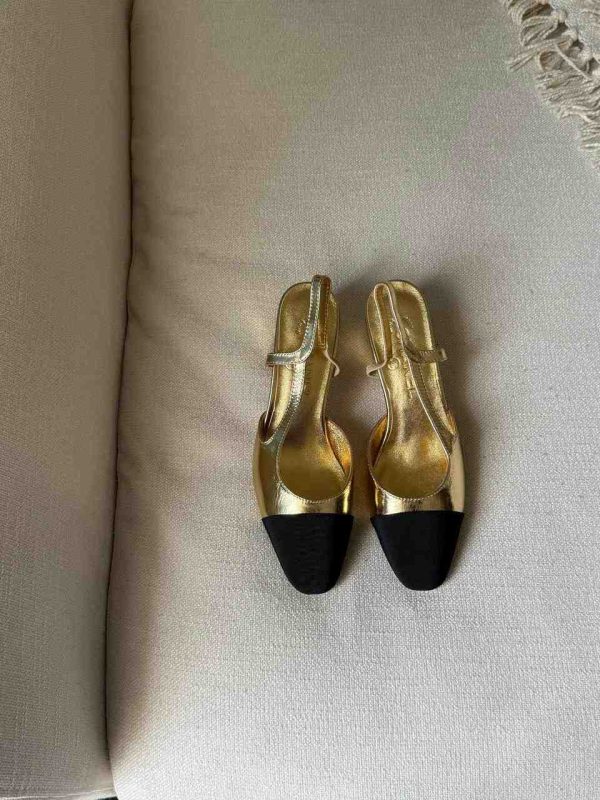 Chanel Gold And Black Laminated Lambskin Leather CC Slingback Pumps