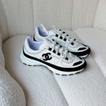 Chanel Suede Calfskin Black And White Suede CC Sneakers