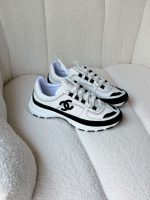 Chanel Suede Calfskin Black And White Suede CC Sneakers