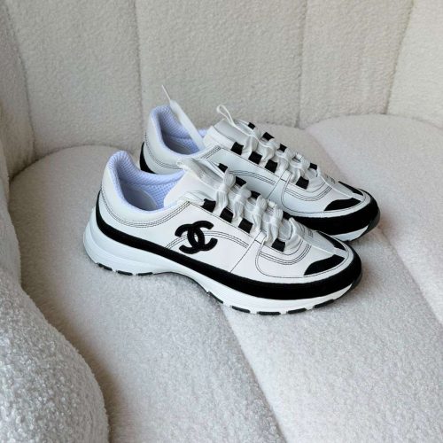 Chanel Suede Calfskin Black And White Suede CC Sneakers
