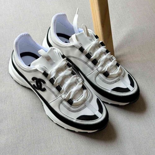 Chanel Suede Calfskin Black And White Suede CC Sneakers