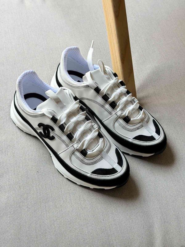 Chanel Suede Calfskin Black And White Suede CC Sneakers