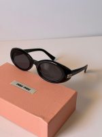 Miu Miu Black MU BO99S Oval Sunglasses With Gold Logo