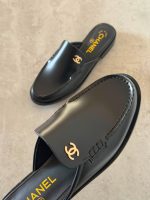Chanel CC Logo Smooth Calfskin Mules In Black