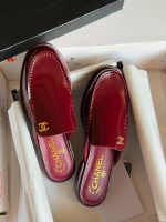 Chanel CC Logo Smooth Calfskin Mules In Burgundy