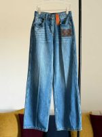 Louis Vuitton Stonewashed Monogram Patch Boot-Cut Jeans - Image 2