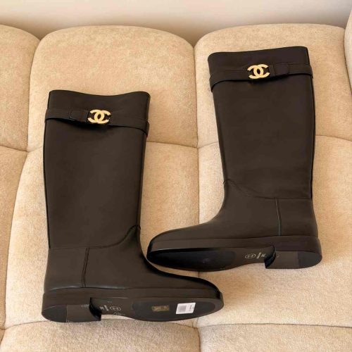 Chanel calfskin cc buckle high boots in black