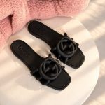 Gucci women's Interlocking g slide sandals in black