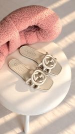Gucci women's Interlocking g slide sandals in white