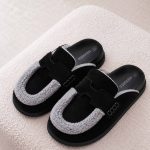 Hermes go mule black with contrasting fur trim