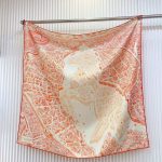 Hermes la nouvelle cite cavaliere shawl 140 in rust orange and cream
