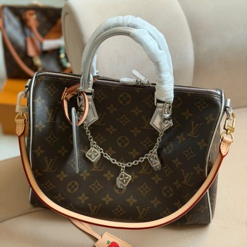 Louis Vuitton Speedy 30 57th Street NYC Bandouliere Monogram Brown and Silver Handbag