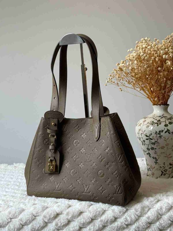 Louis vuitton all in one pm bag in embossed monogram empreinte