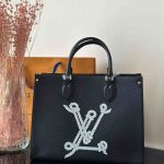 Louis vuitton onthego mm navy blue grained calf bag in nautical collection