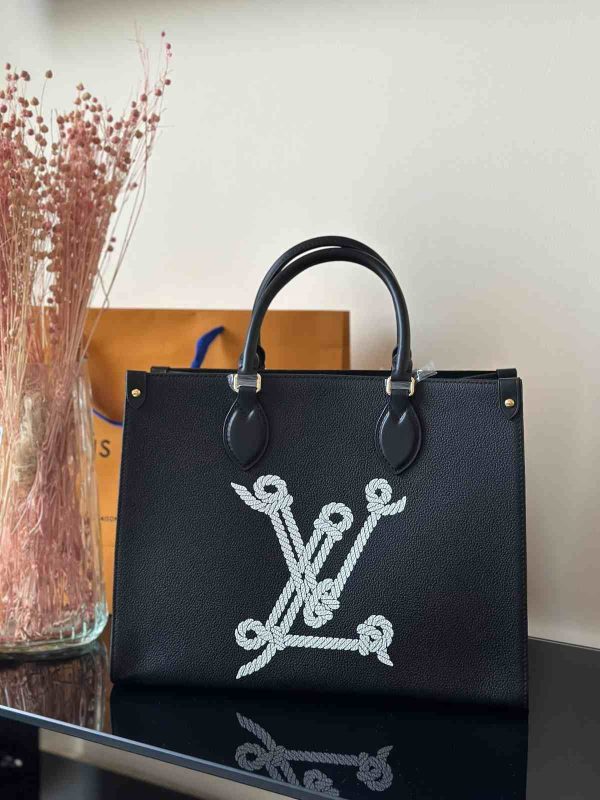 Louis vuitton onthego mm navy blue grained calf bag in nautical collection