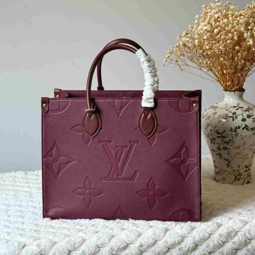Louis vuitton onthego mm bag in wine
