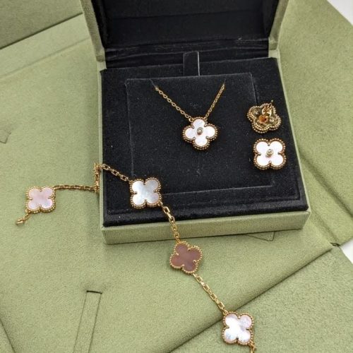 Van cleef & arpels vintage alhambra four leaf clover jewelry in white, gold and pink